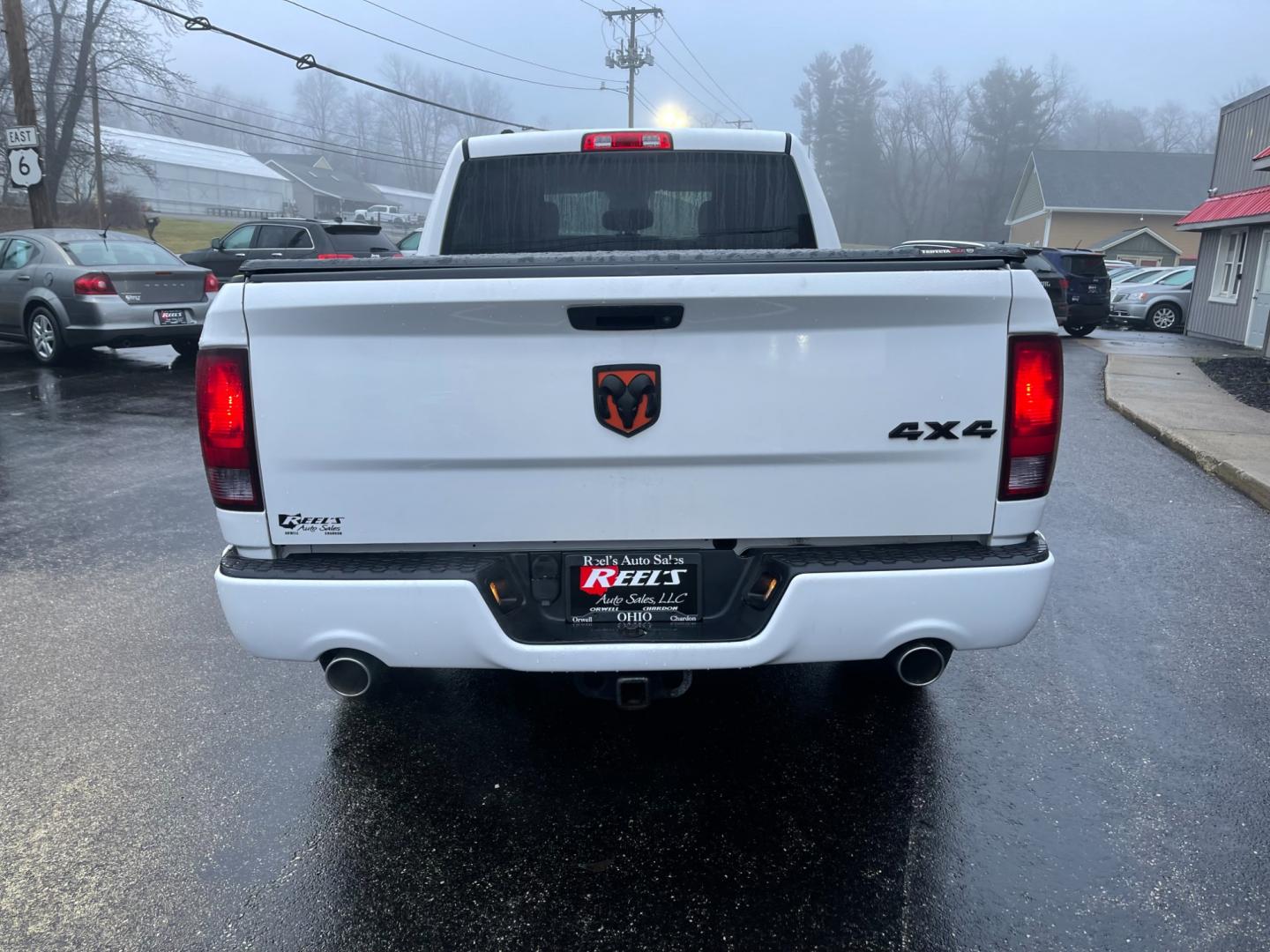 2014 White /Black RAM 1500 Express Quad Cab 4WD (1C6RR7FT5ES) with an 5.7L V8 OHV 16V engine, 8-Speed Automatic transmission, located at 11115 Chardon Rd. , Chardon, OH, 44024, (440) 214-9705, 41.580246, -81.241943 - Photo#10